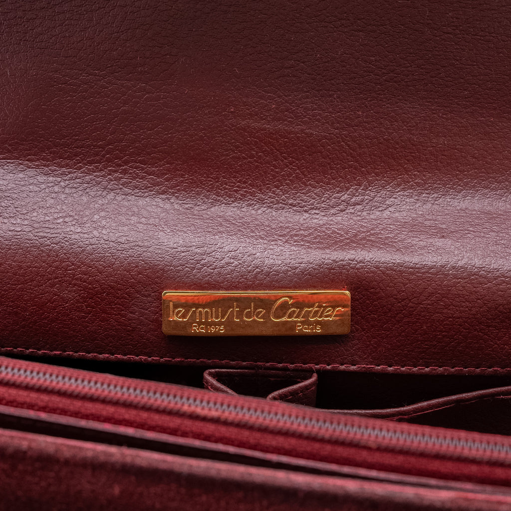 Cartier Les Must de Cartier Bordeaux Suede Clutch from the 1970's